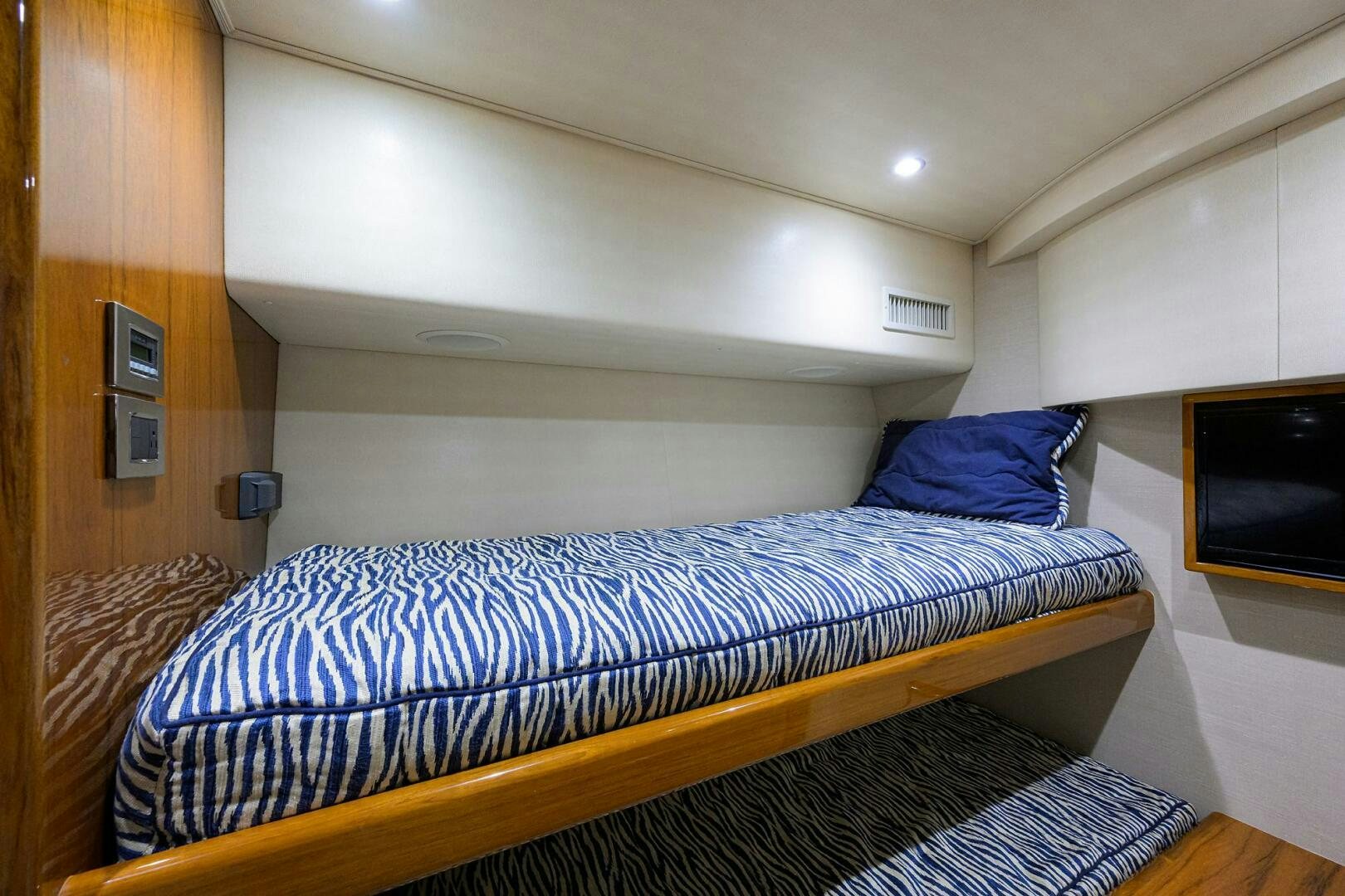 a bed in a room aboard TORTA Yacht for Sale