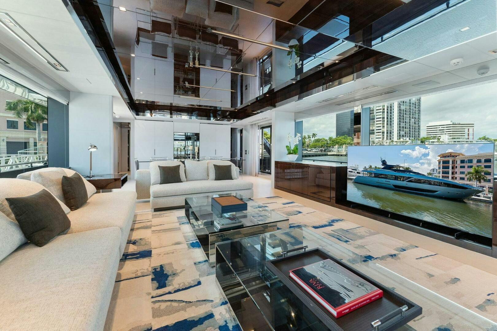 a living room with a large pool aboard 110' RIVA DOLCEVITA 2024 Yacht for Sale