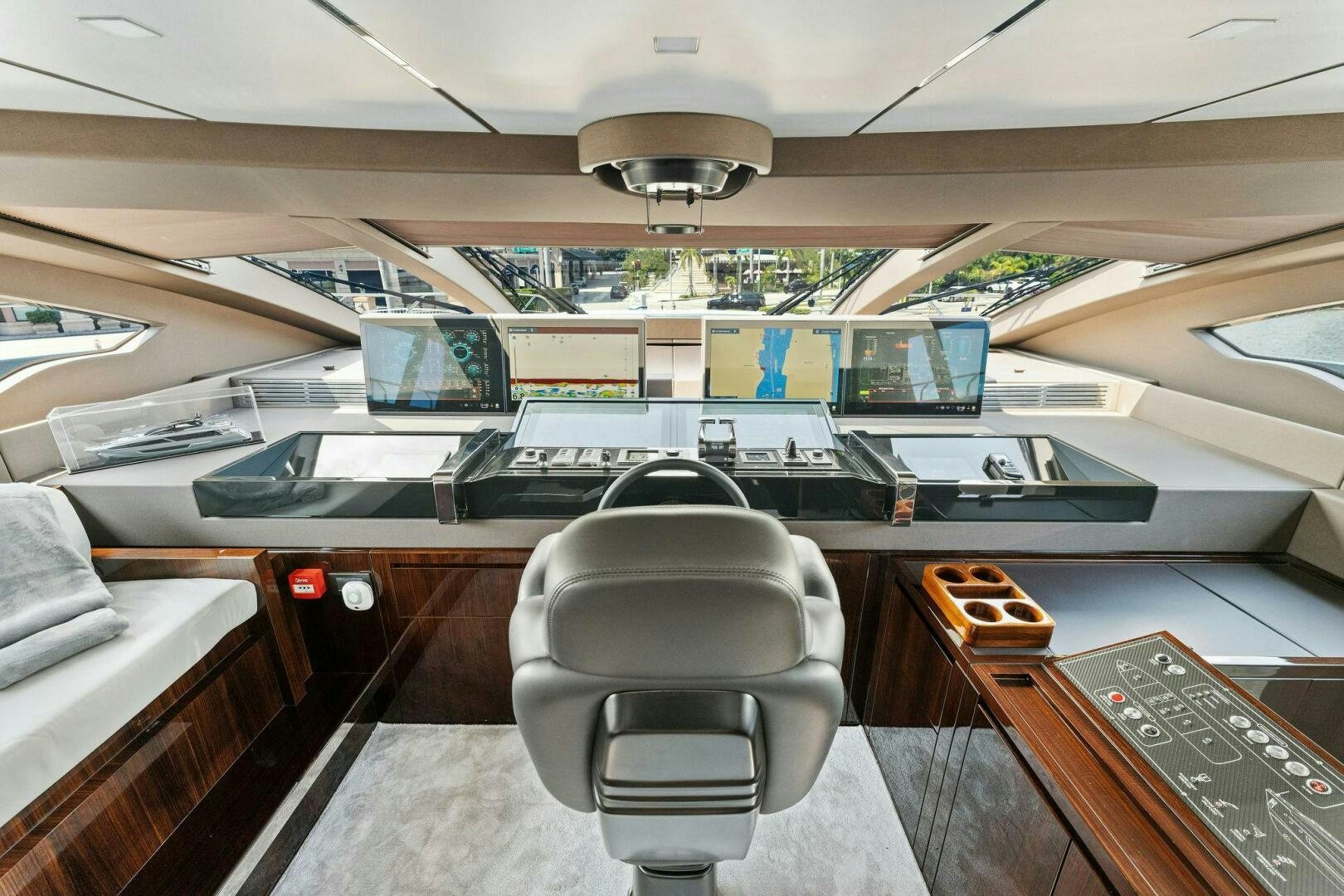 a room with computers and chairs aboard 110' RIVA DOLCEVITA 2024 Yacht for Sale