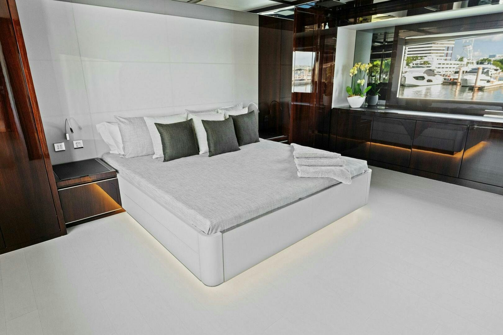 a bed with white sheets aboard 110' RIVA DOLCEVITA 2024 Yacht for Sale