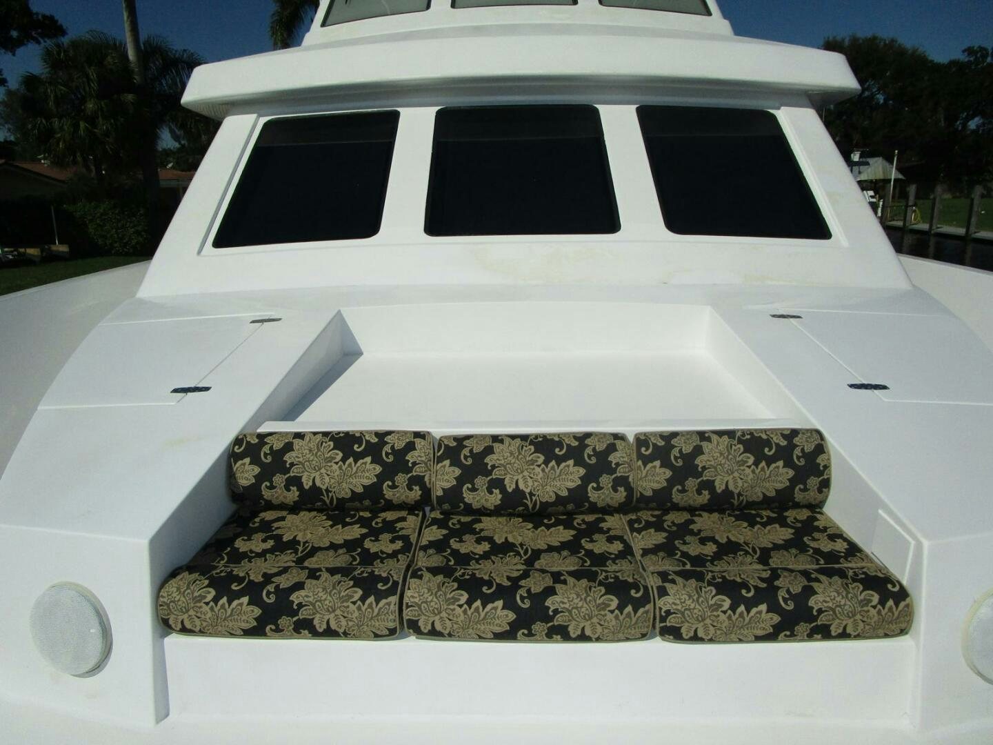 a white car with a hole in the roof aboard LADY D Yacht for Sale