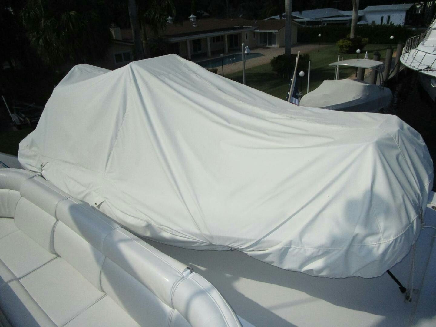 a white umbrella on a white surface aboard LADY D Yacht for Sale