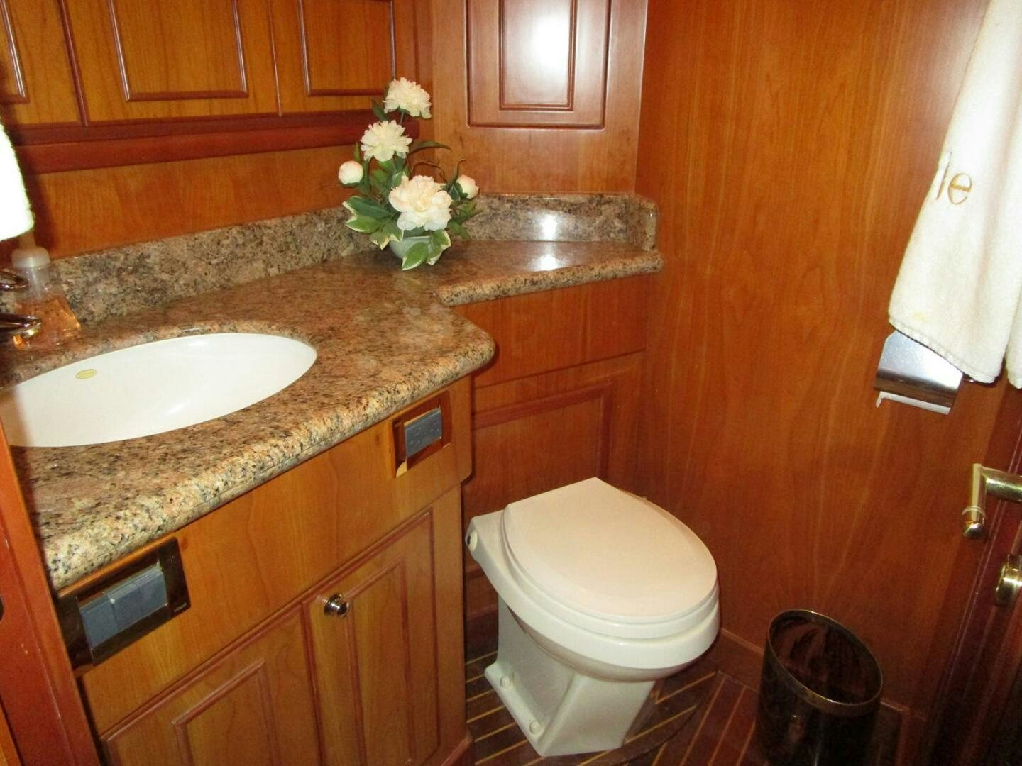 a bathroom with a sink and toilet aboard LADY D Yacht for Sale