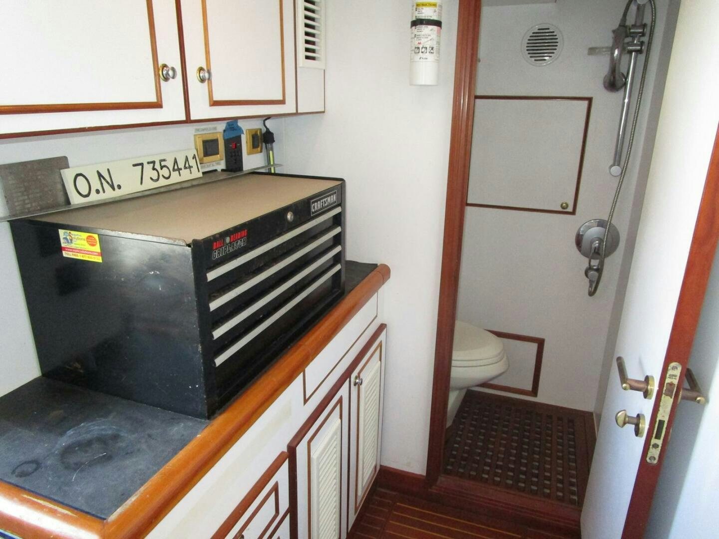 a kitchen with a stove and oven aboard LADY D Yacht for Sale