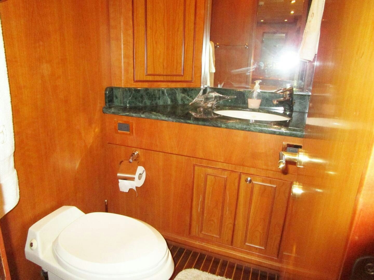 a bathroom with a glass counter aboard LADY D Yacht for Sale