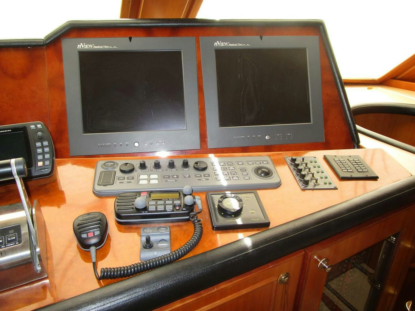 a computer on a desk aboard LADY D Yacht for Sale