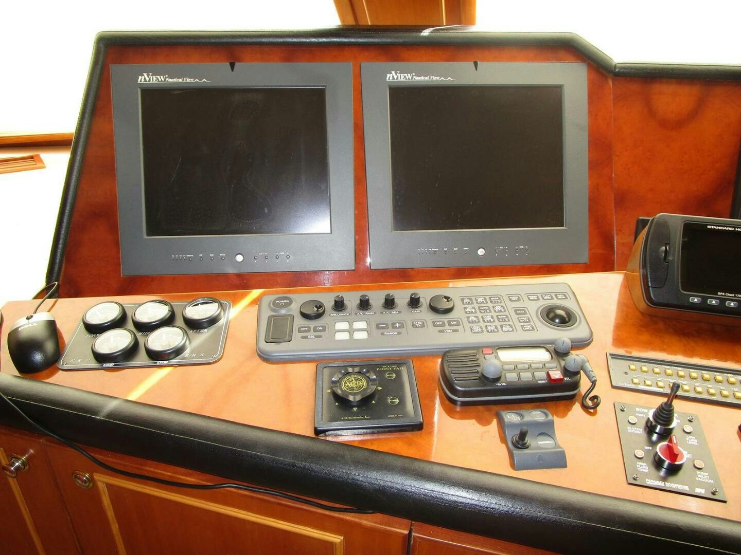 a tv on a table aboard LADY D Yacht for Sale