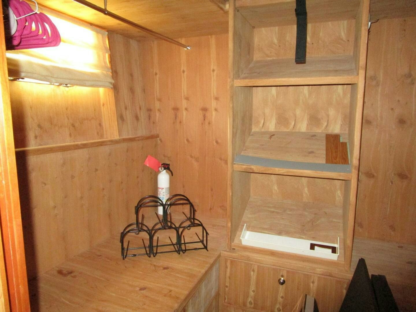 a wooden bunk bed in a wooden room aboard LADY D Yacht for Sale