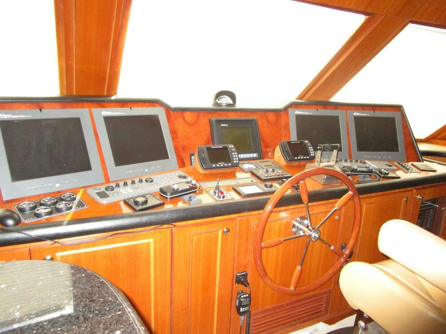 a room with many computers and monitors aboard LADY D Yacht for Sale
