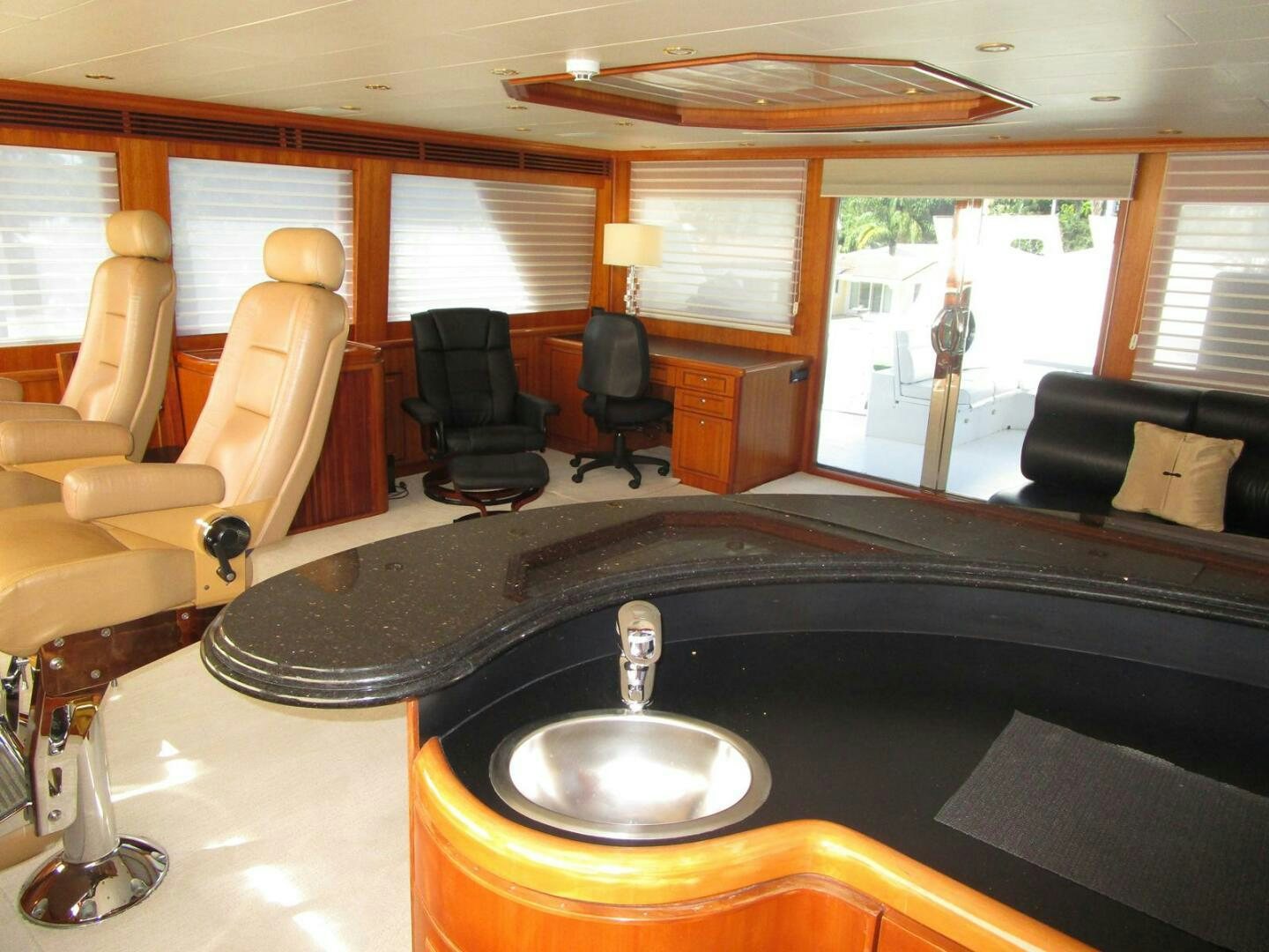 a bathroom with a sink and a mirror aboard LADY D Yacht for Sale