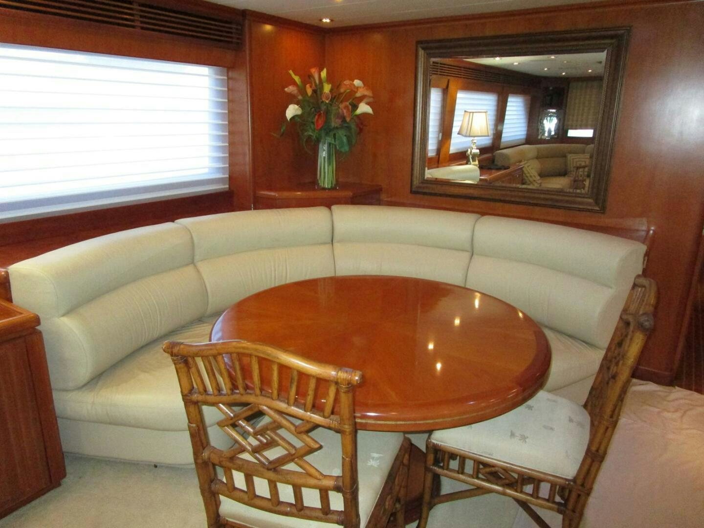 a living room with a couch and a table aboard LADY D Yacht for Sale