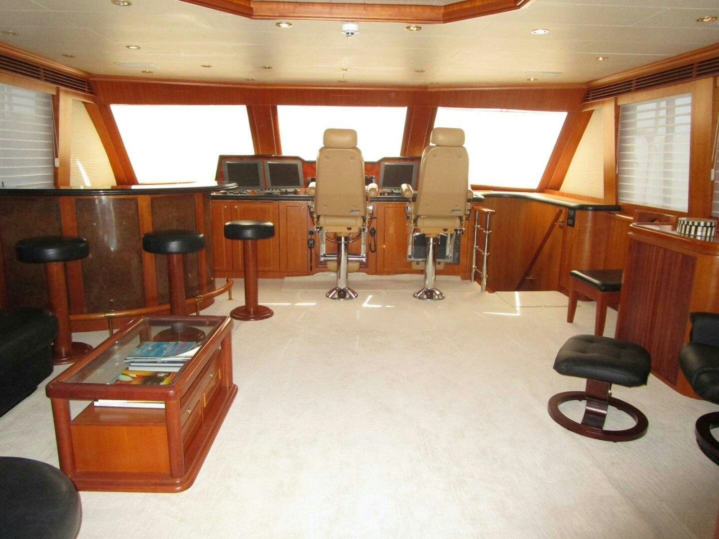 a room with stools and stools aboard LADY D Yacht for Sale