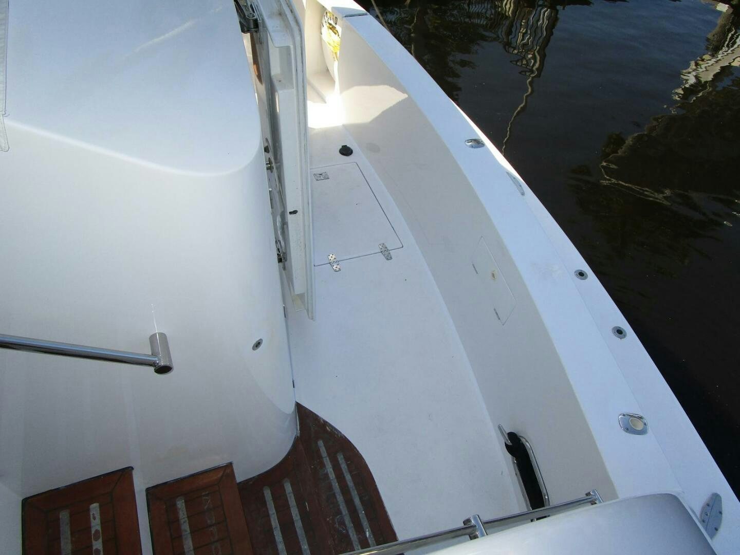 a white building with a red roof aboard LADY D Yacht for Sale