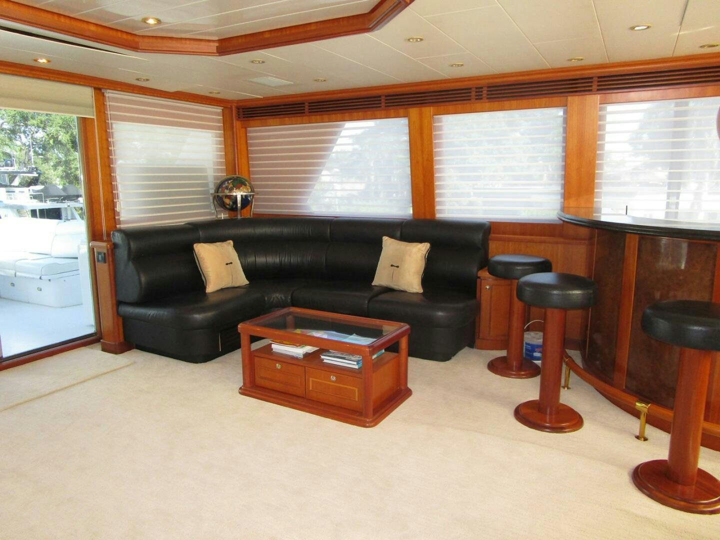 a living room with a leather couch aboard LADY D Yacht for Sale