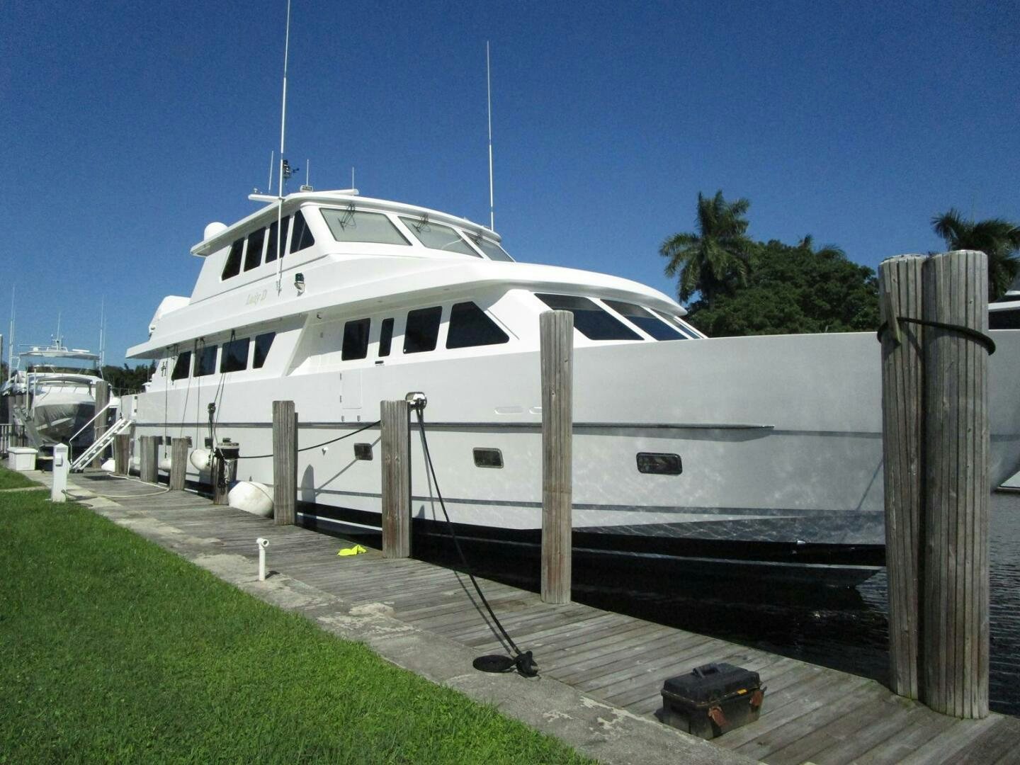 a white yacht docked aboard LADY D Yacht for Sale