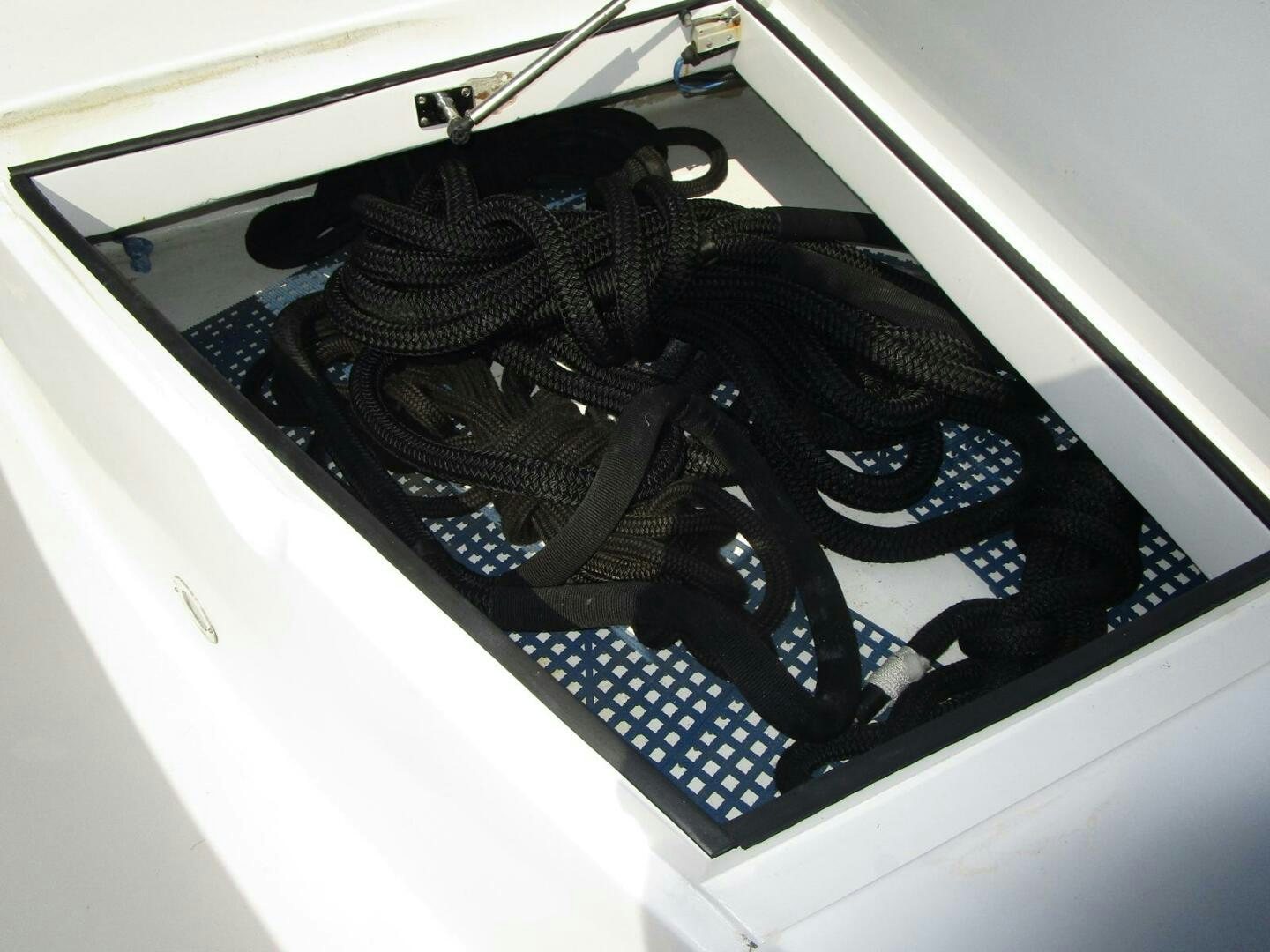 a car with a hood open aboard LADY D Yacht for Sale