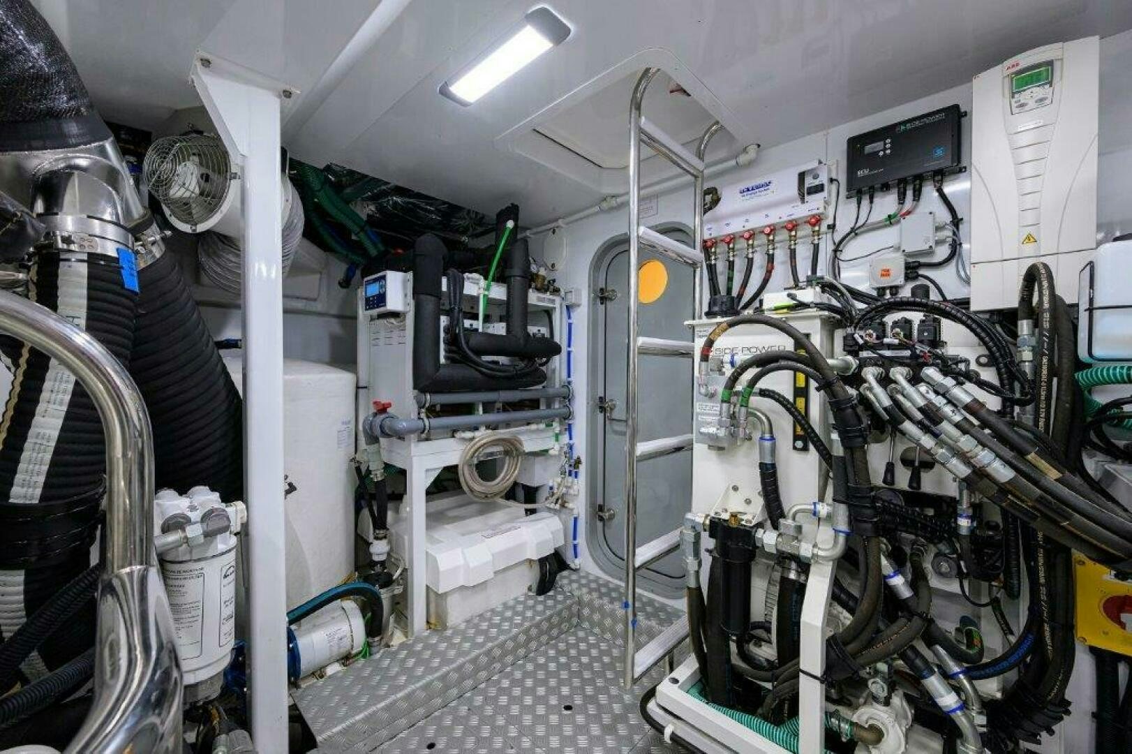 a room with machinery aboard TARHEEL Yacht for Sale