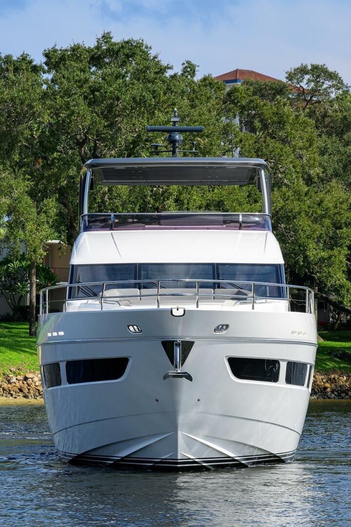 a white boat in the water aboard TARHEEL Yacht for Sale