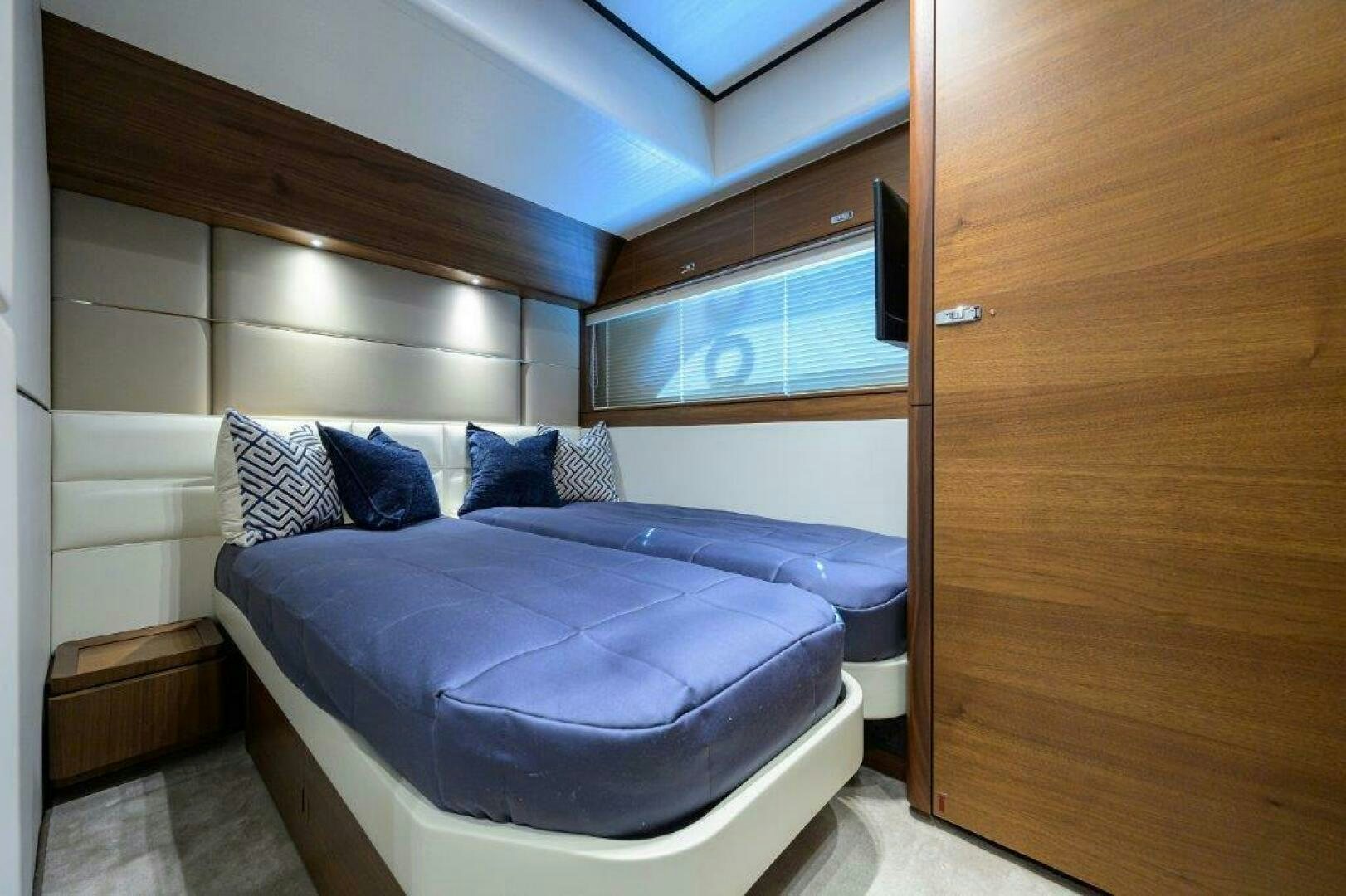 a bed in a room aboard TARHEEL Yacht for Sale