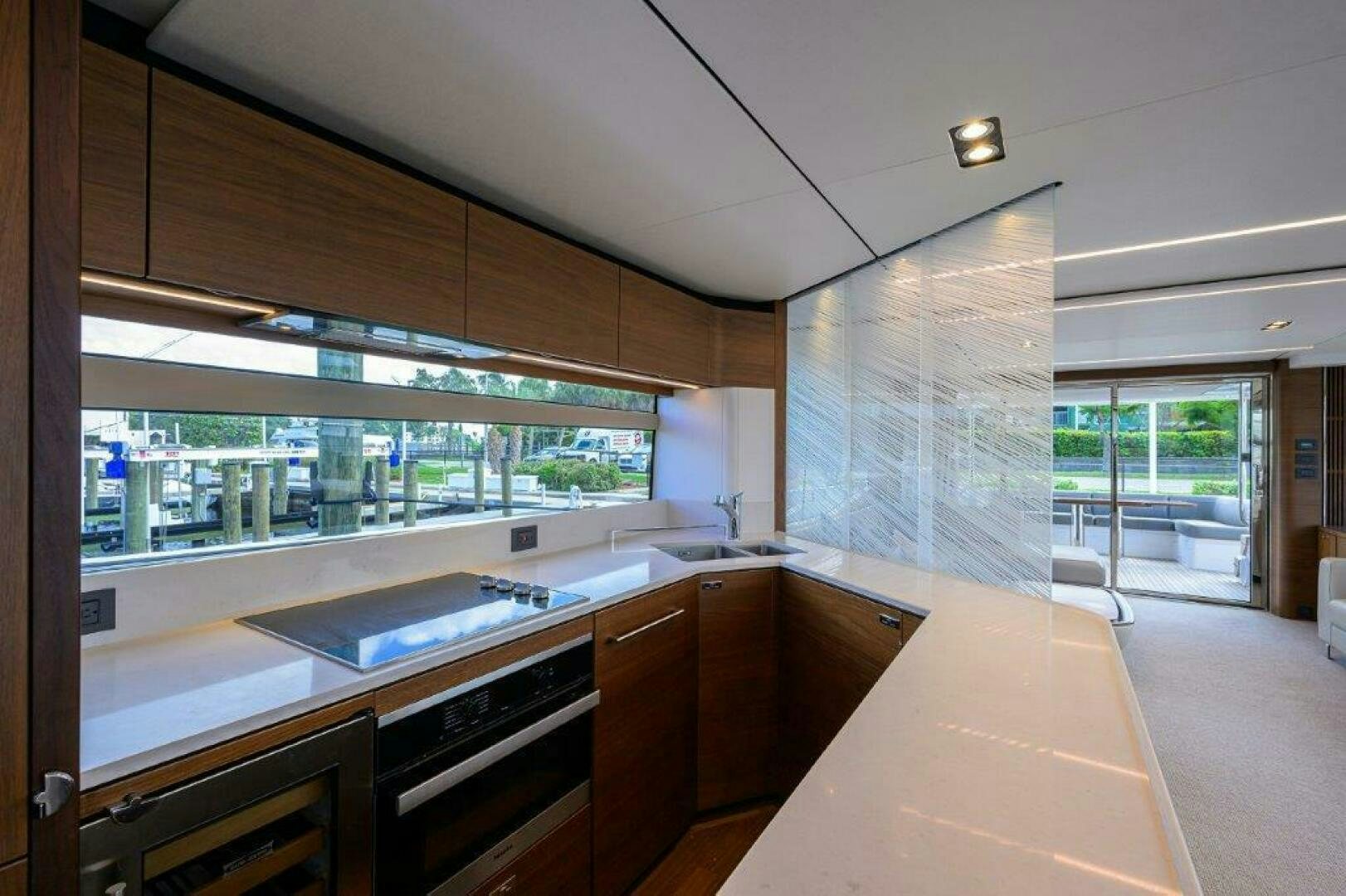 a kitchen with a large island aboard TARHEEL Yacht for Sale