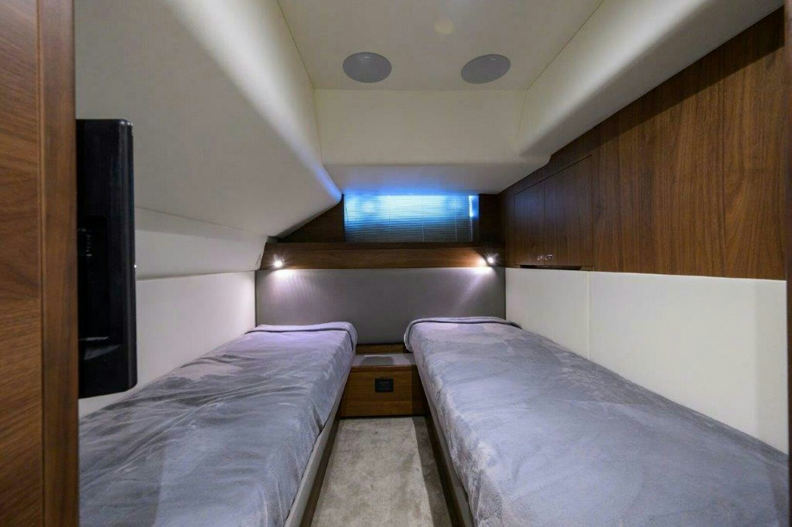 a room with two beds aboard TARHEEL Yacht for Sale