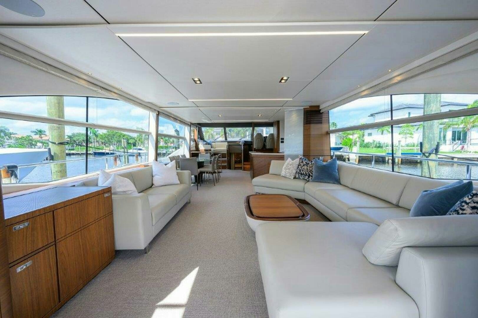 a living room with a large window aboard TARHEEL Yacht for Sale