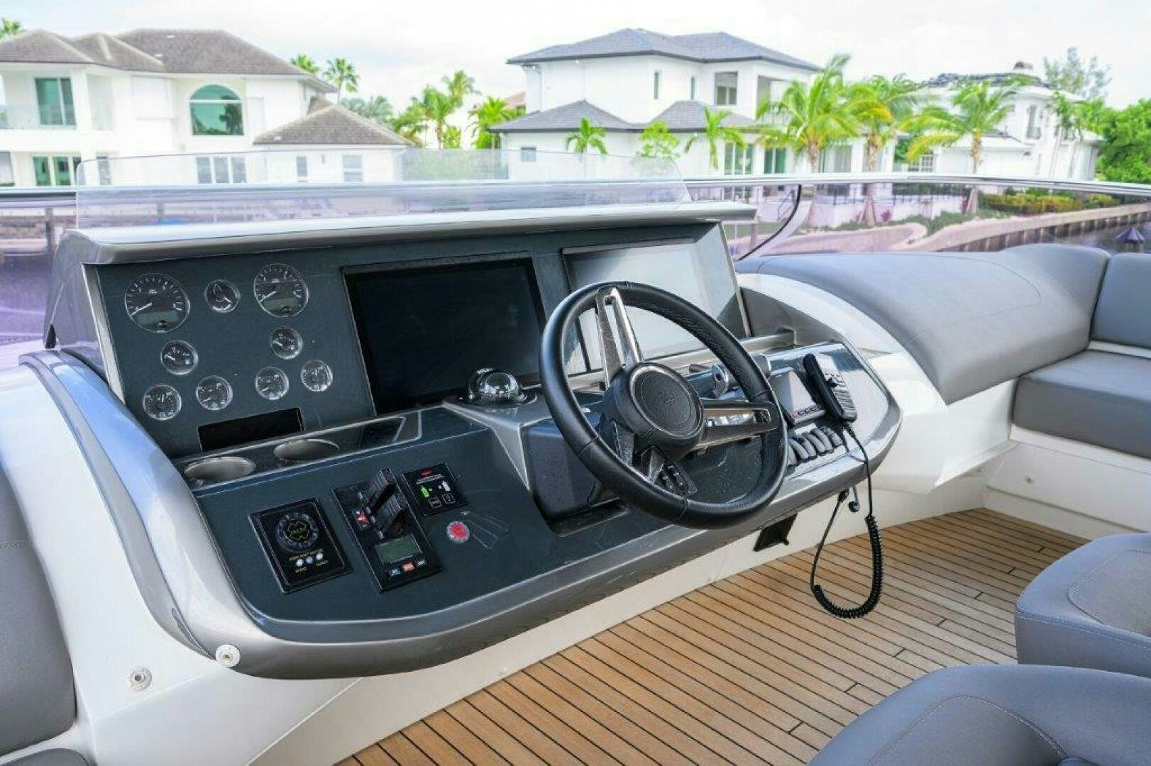 a car with a steering wheel aboard TARHEEL Yacht for Sale