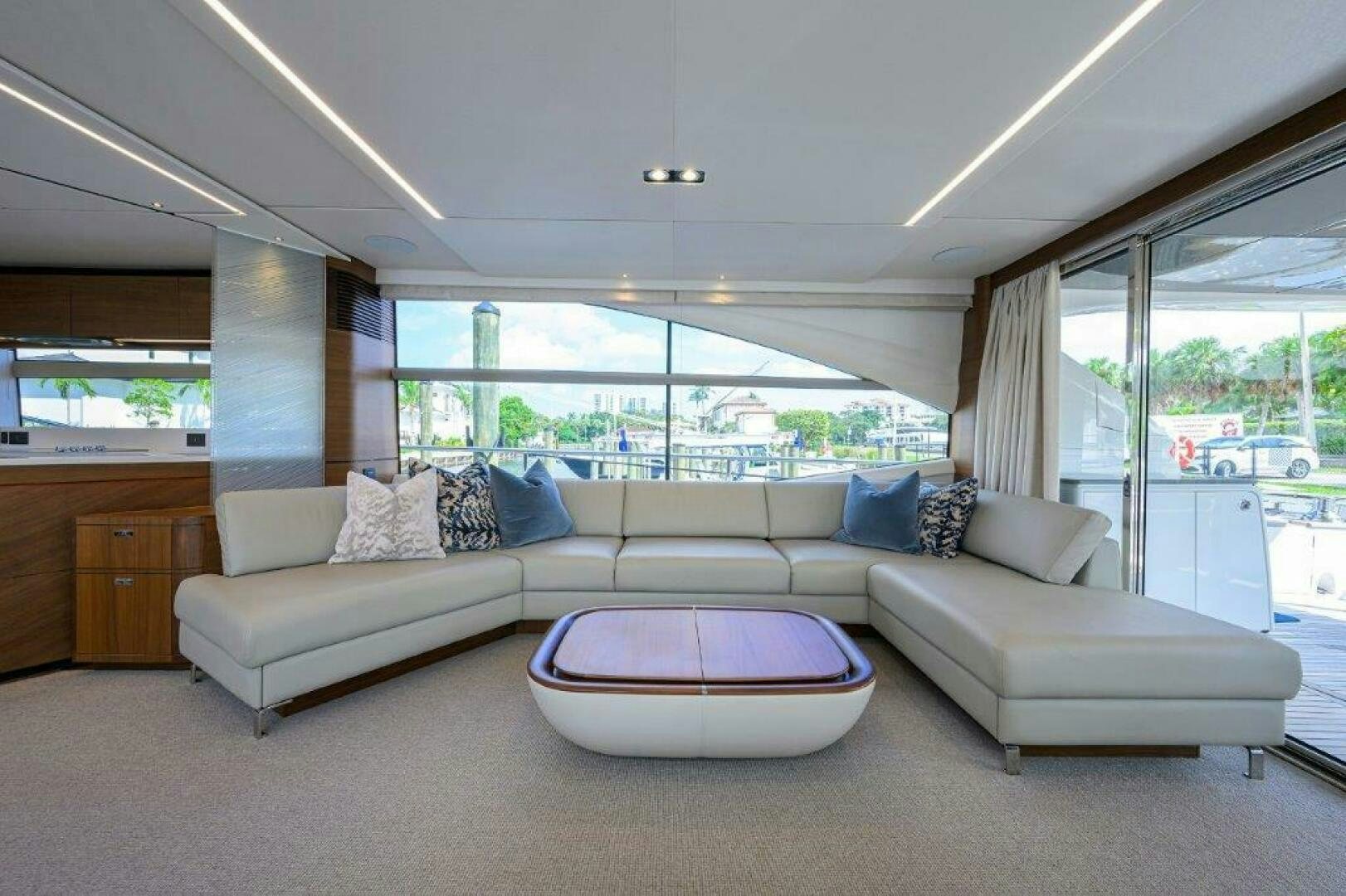 a living room with a large window aboard TARHEEL Yacht for Sale