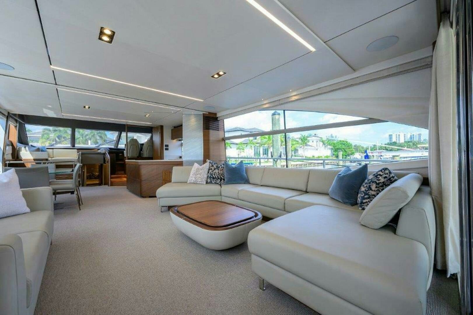 a living room with a large window aboard TARHEEL Yacht for Sale