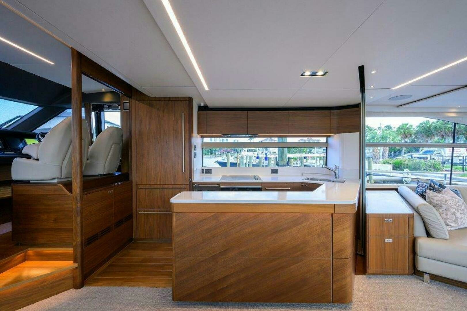a room with a bed and a wood door aboard TARHEEL Yacht for Sale