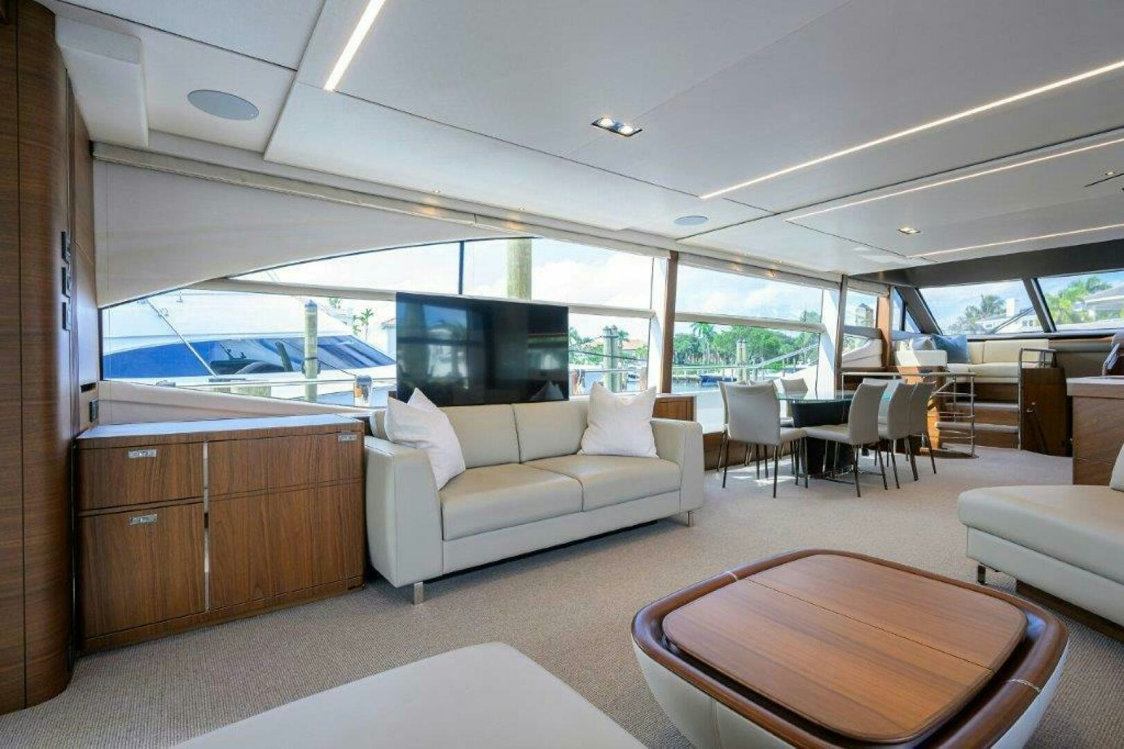 a living room with a large window aboard TARHEEL Yacht for Sale