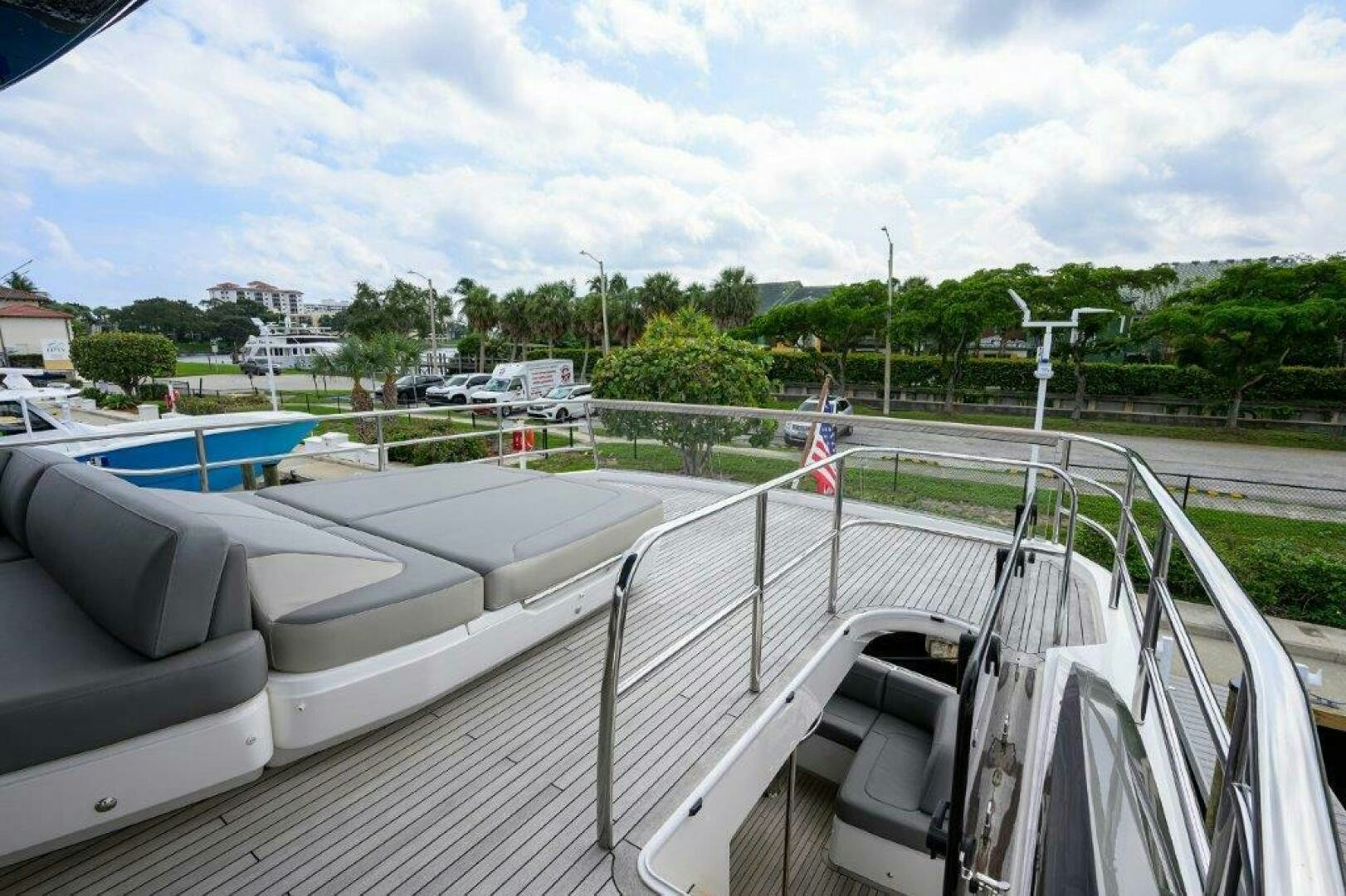 a view of a parking lot from a balcony aboard TARHEEL Yacht for Sale