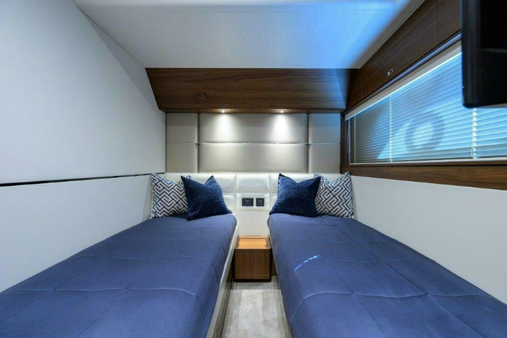 a couple of beds in a room aboard TARHEEL Yacht for Sale