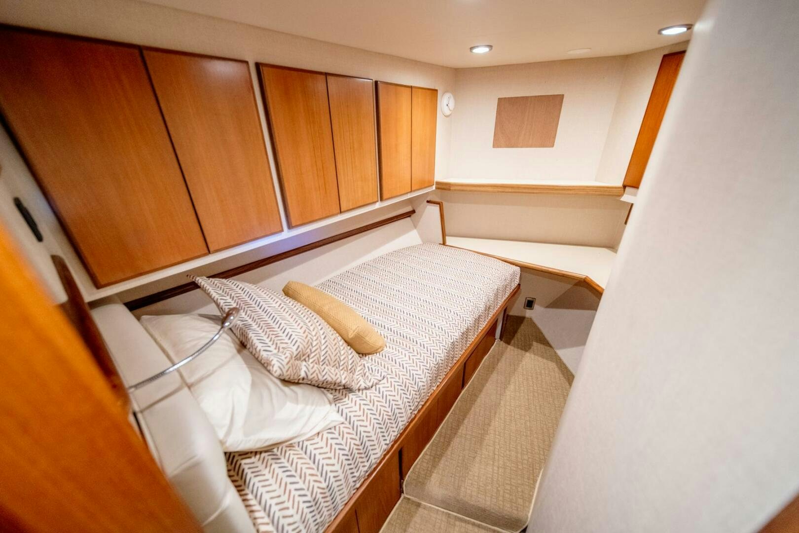a bed in a room aboard SEA LION Yacht for Sale