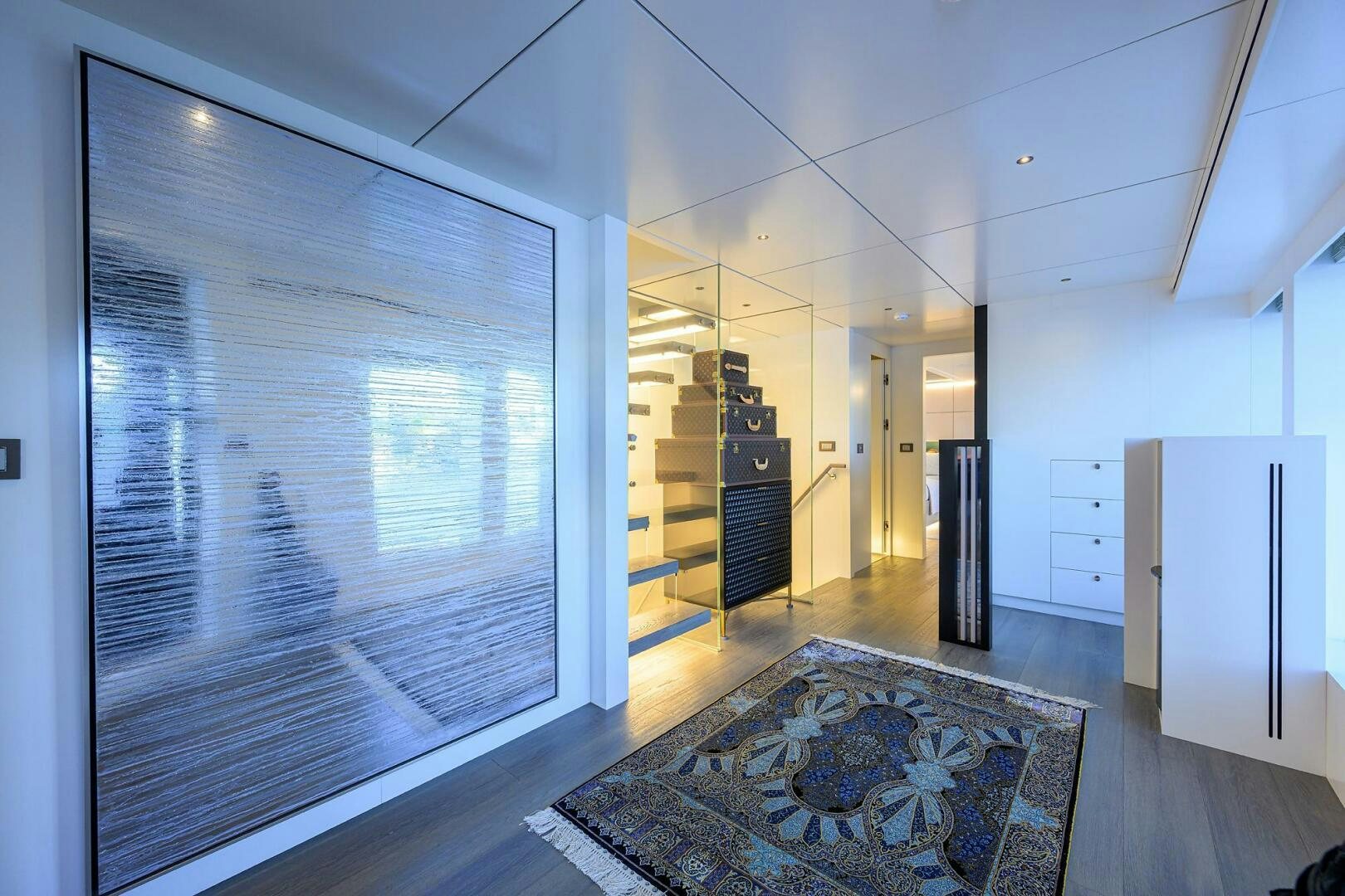 a room with a large window aboard AMORE Yacht for Sale