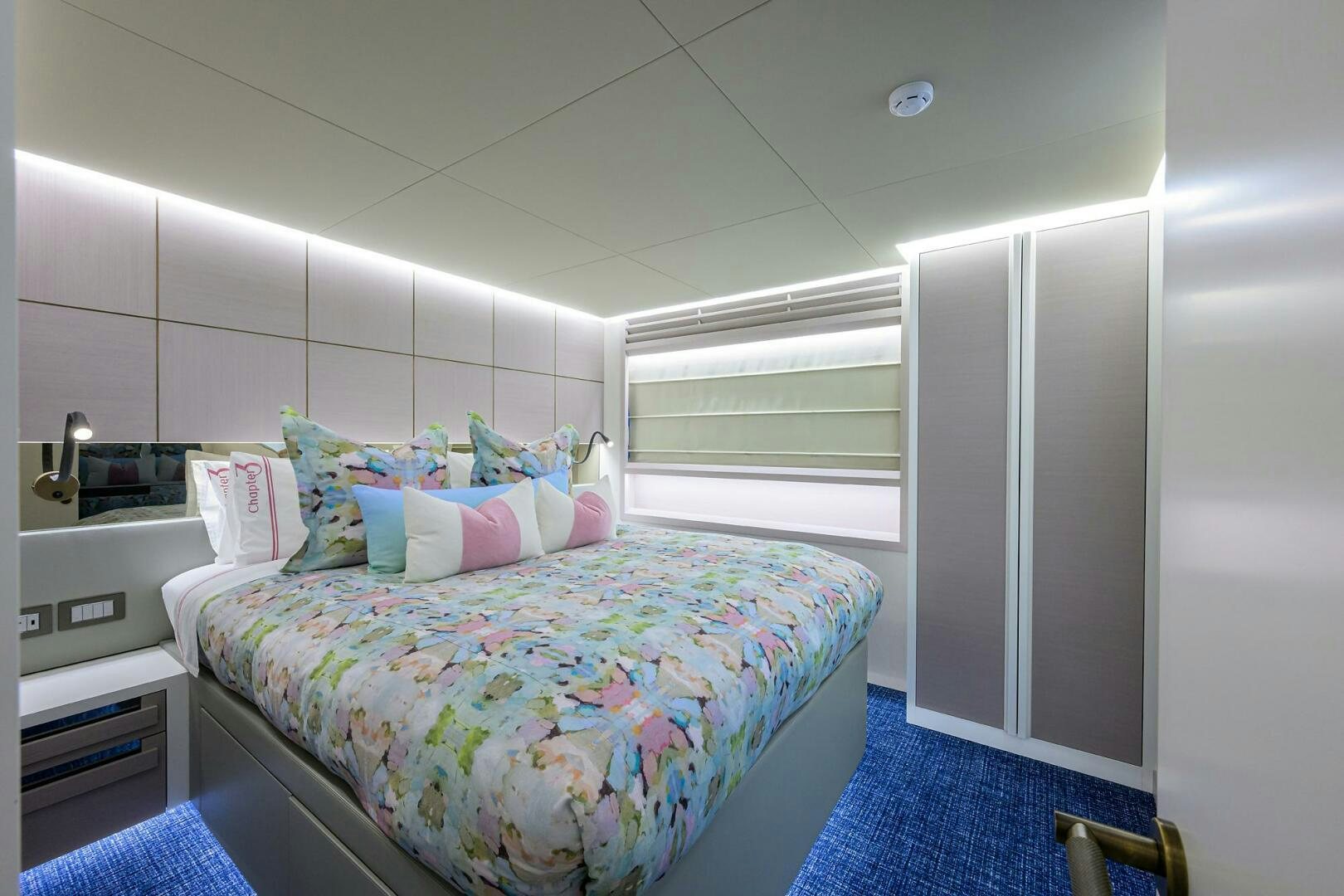 a bed in a room aboard AMORE Yacht for Sale