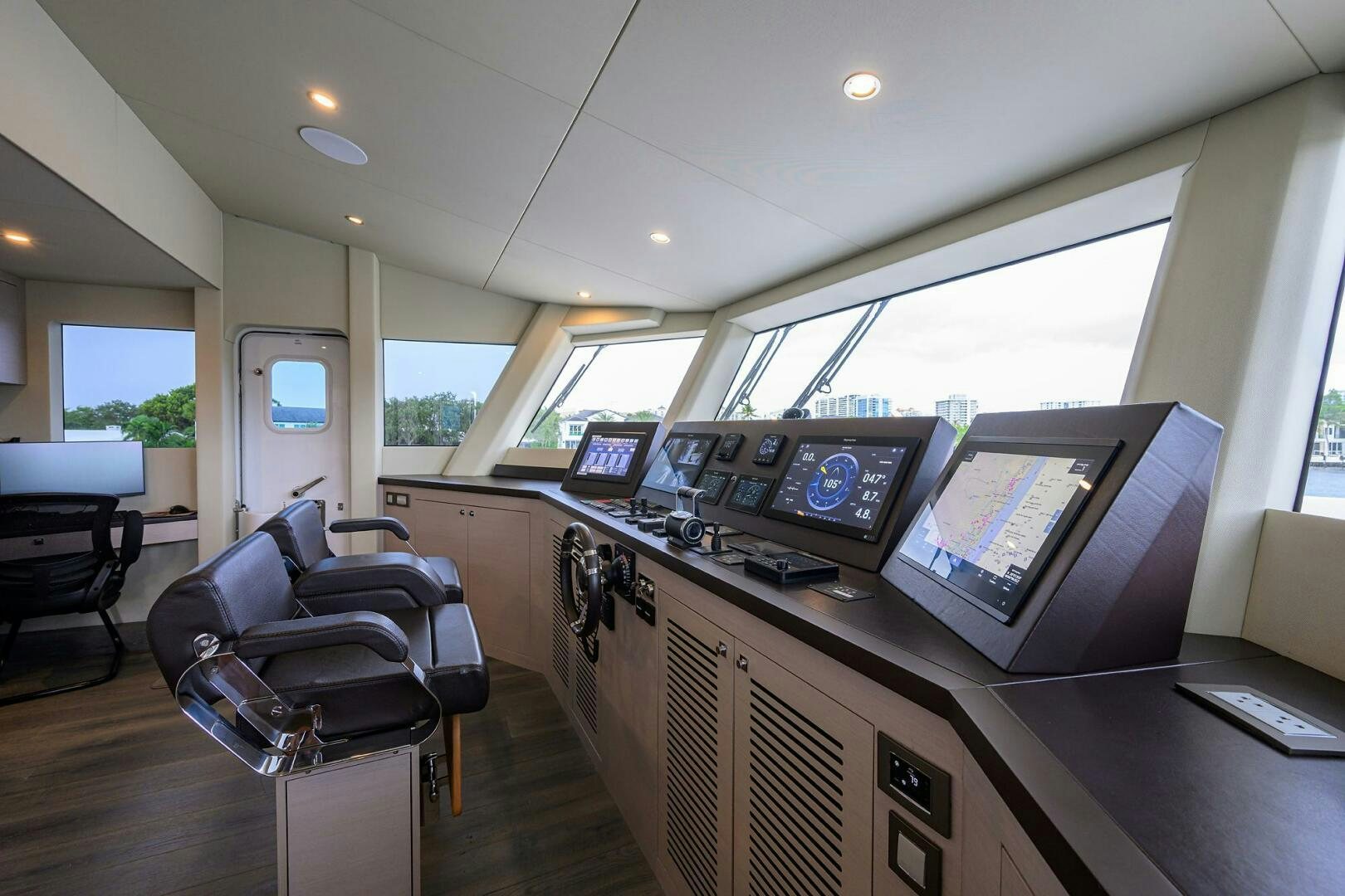 inside of a vehicle with computers aboard AMORE Yacht for Sale