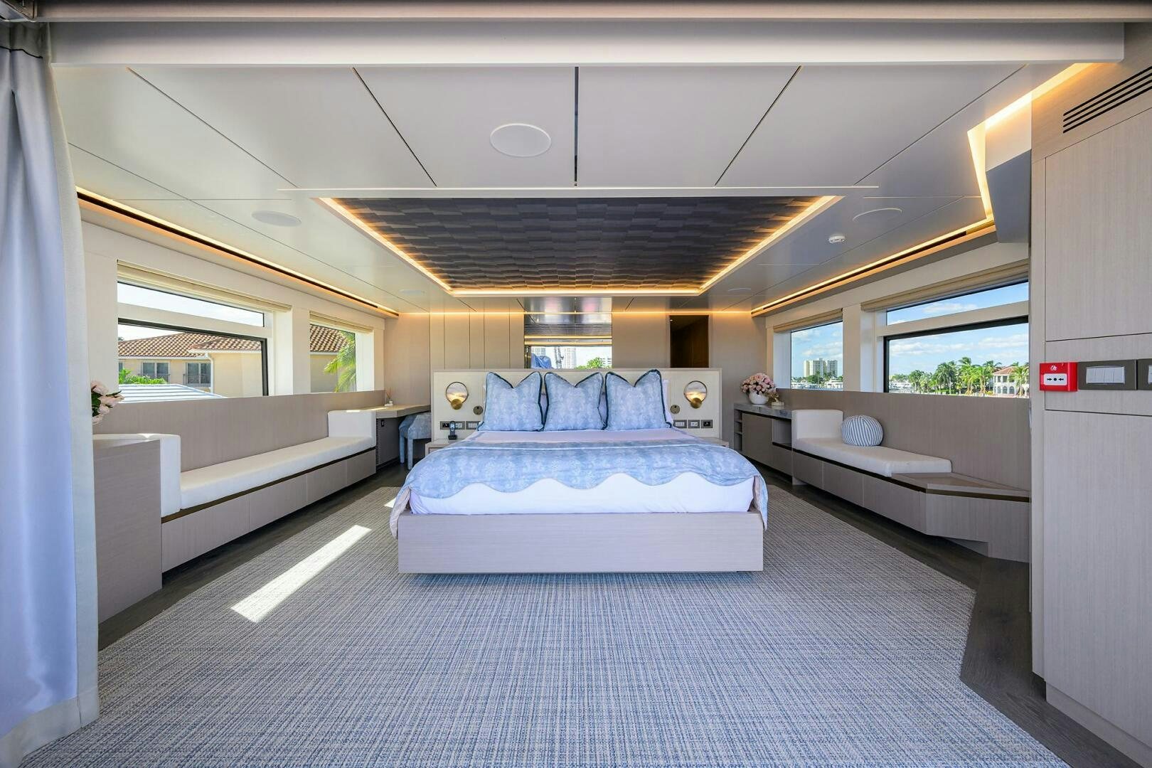 a room with a bed and a couch aboard AMORE Yacht for Sale