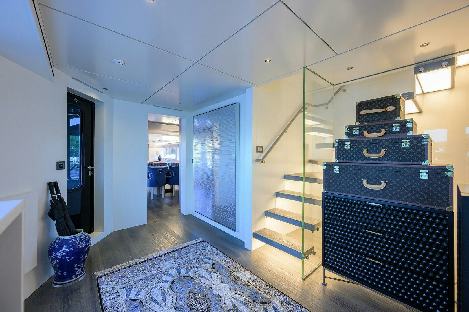 a room with a black cabinet and a black cabinet with drawers aboard AMORE Yacht for Sale