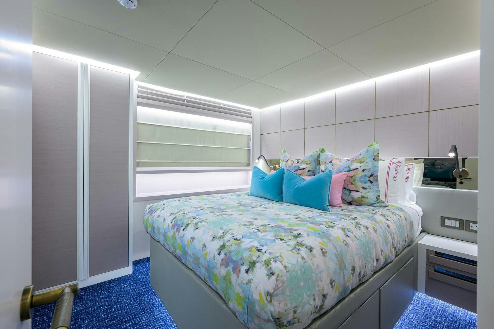 a bedroom with a bed aboard AMORE Yacht for Sale