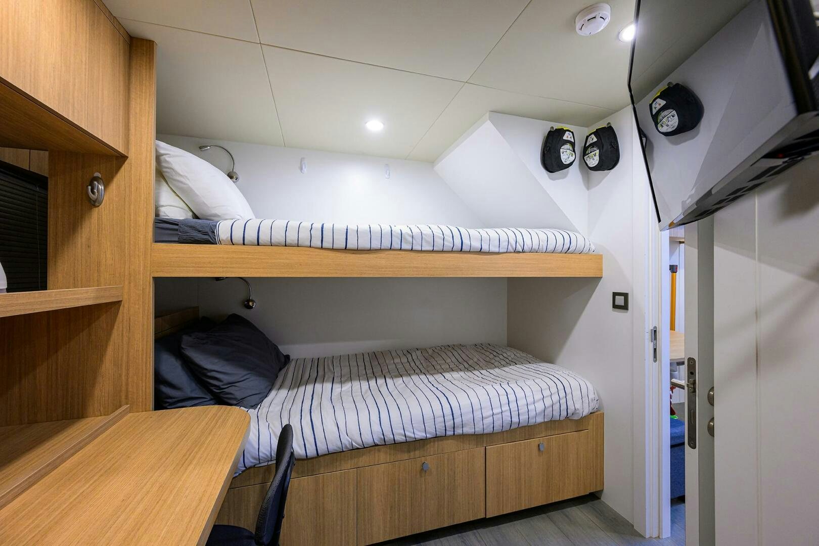 a bunk bed in a room aboard AMORE Yacht for Sale