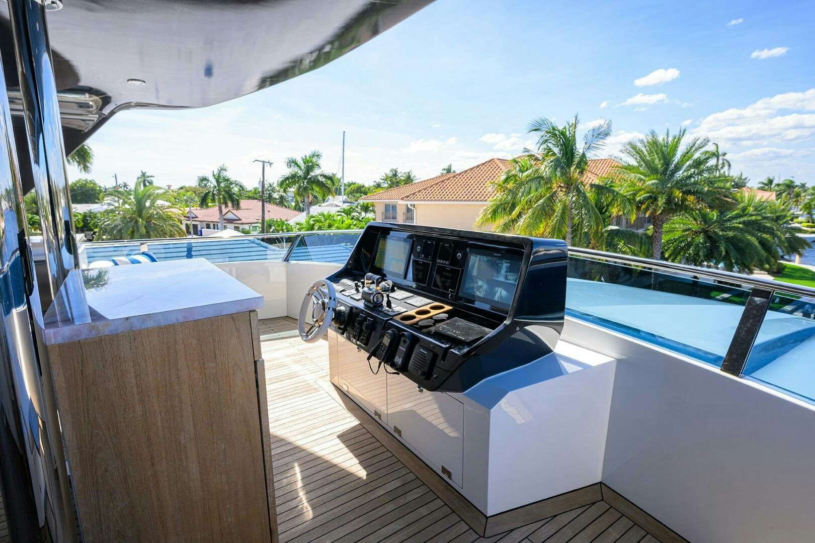 a car on a deck aboard AMORE Yacht for Sale