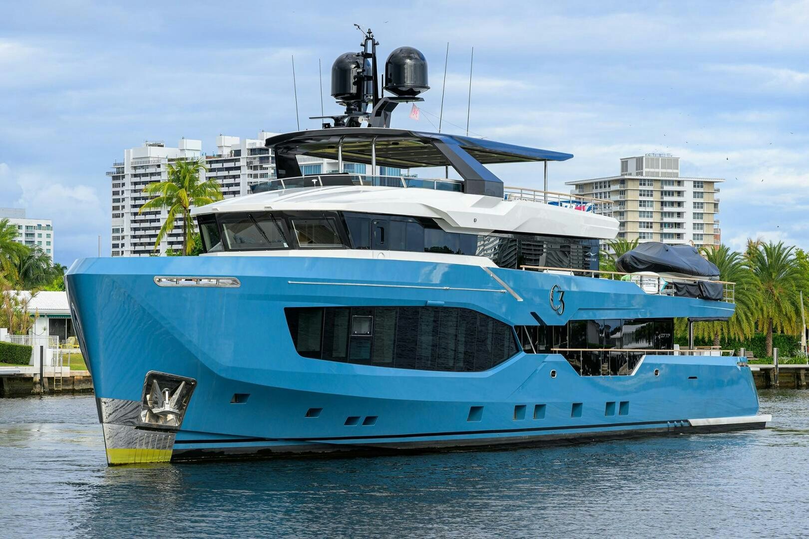 a large blue and white boat aboard AMORE Yacht for Sale