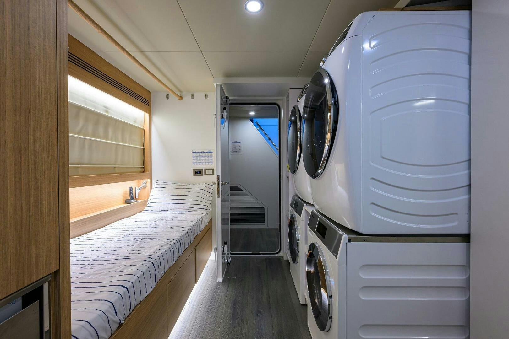 a room with a bed and a large white machine aboard AMORE Yacht for Sale