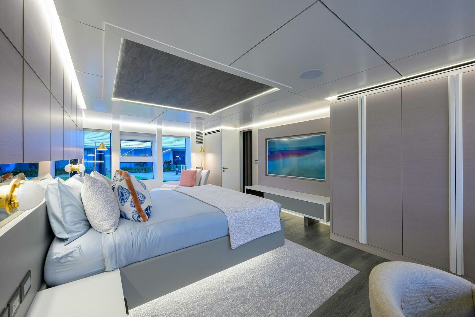 a room with a bed and a tv aboard AMORE Yacht for Sale