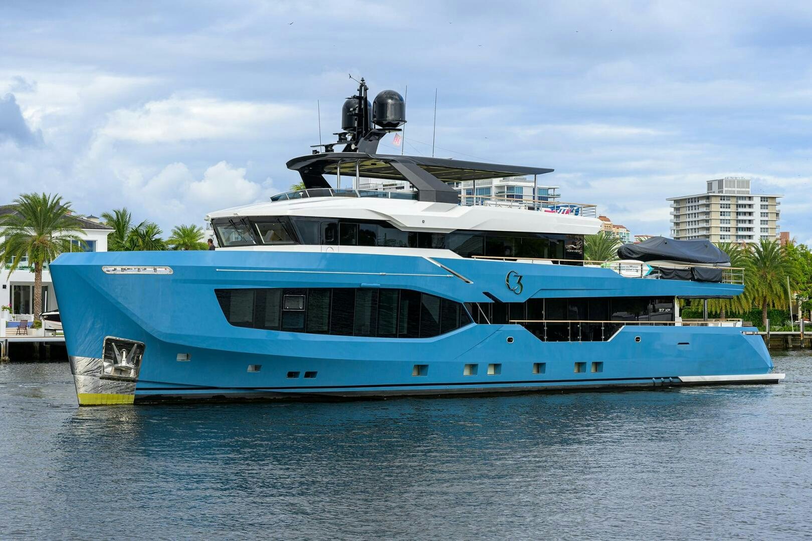a large white boat with a large open roof aboard AMORE Yacht for Sale