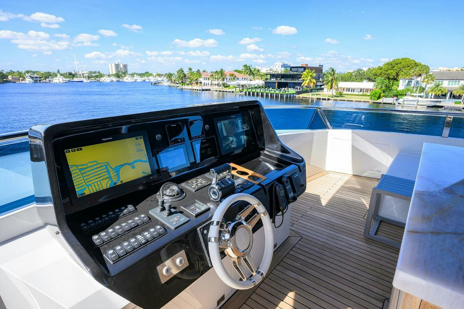 a car on a deck aboard AMORE Yacht for Sale