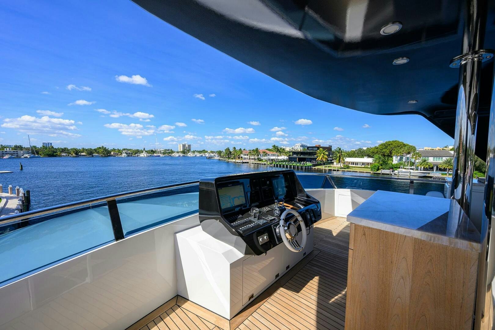 a car on a deck aboard AMORE Yacht for Sale