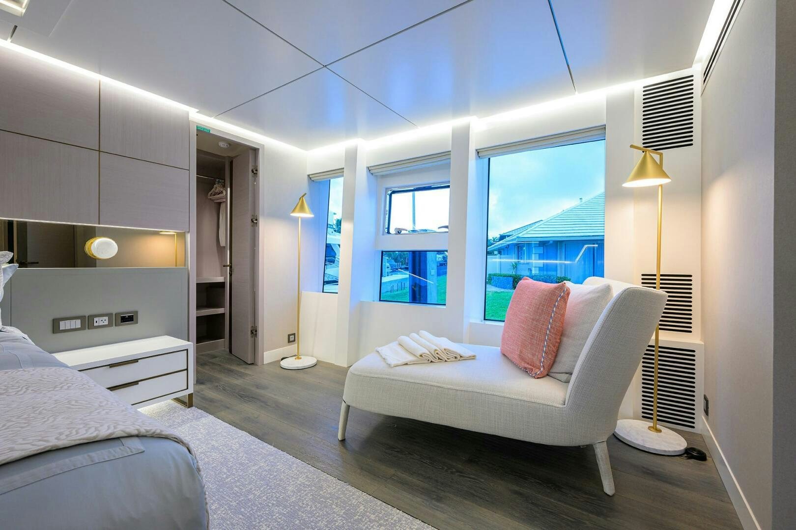 a room with two beds aboard AMORE Yacht for Sale