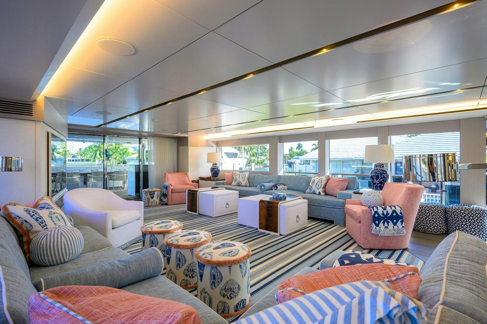 a living room with a large window aboard AMORE Yacht for Sale